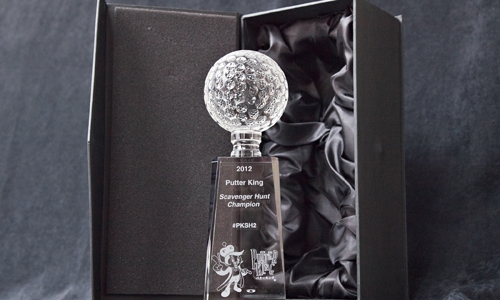 The 2012 Putter King Scavenger Hunt #PKSH2 Champion crystal trophy in its presentation box, topped with a crystal golf ball and engraved with the Putty mascot