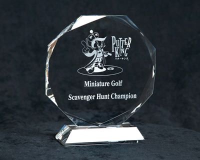 Close-up studio shot of the crystal Miniature Golf Scavenger Hunt Champion trophy